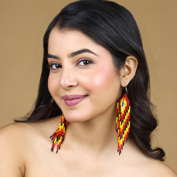 Fiery Sunset Feather Beaded Earrings by Vibhura